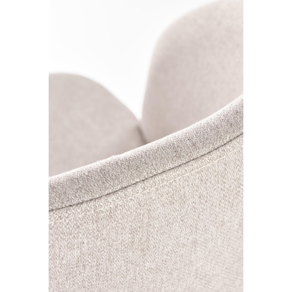 Krzesło beżowe z białymi nogami